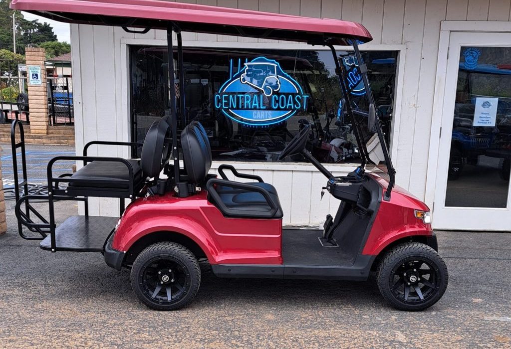 Red 4 passenger golf cart