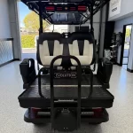 2026 Evolution D5 Maverick 4+2 Plus — Mineral White rear seating and flatbed storage