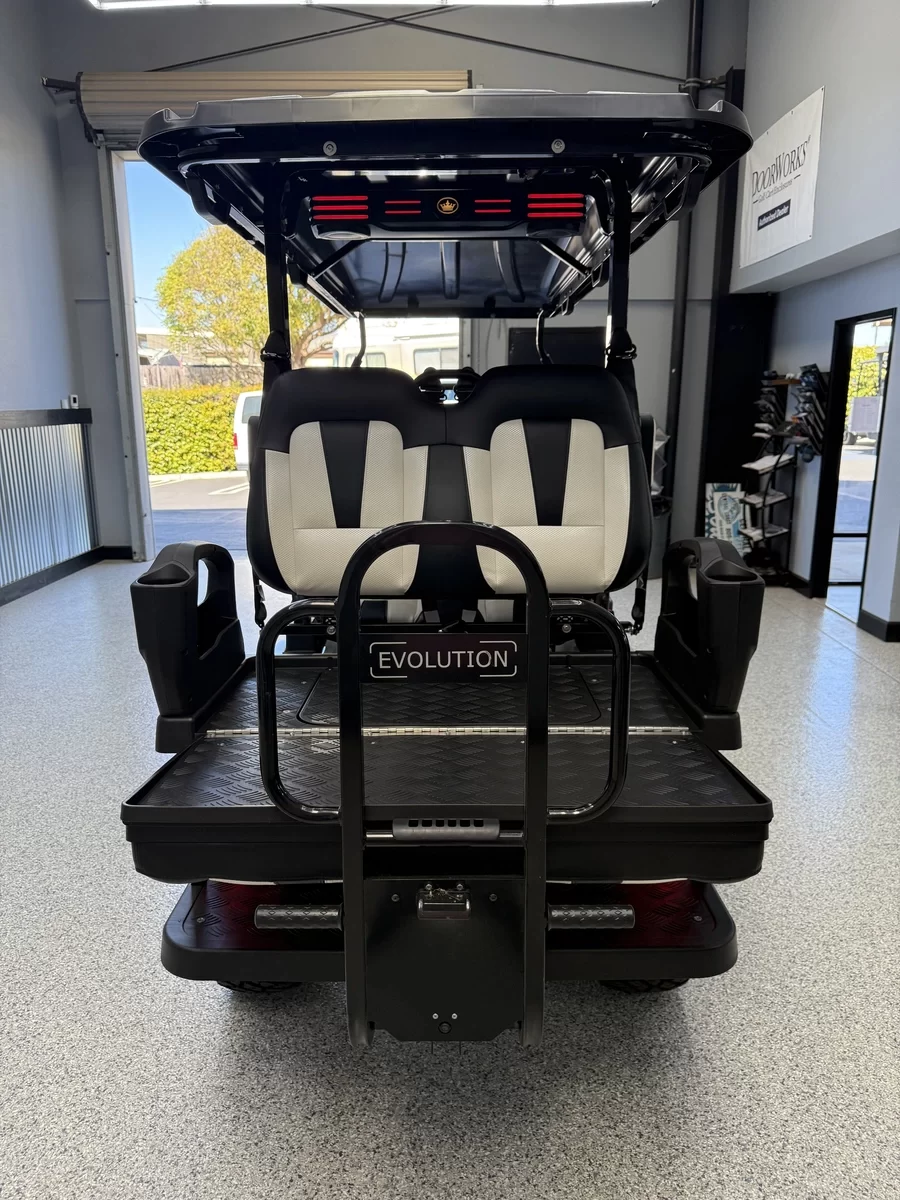 2026 Evolution D5 Maverick 4+2 Plus — Mineral White rear seating and flatbed storage